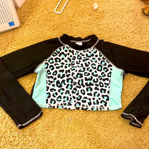 Never worn swimsuit cover up. It also cropped - Picture 1 of 2